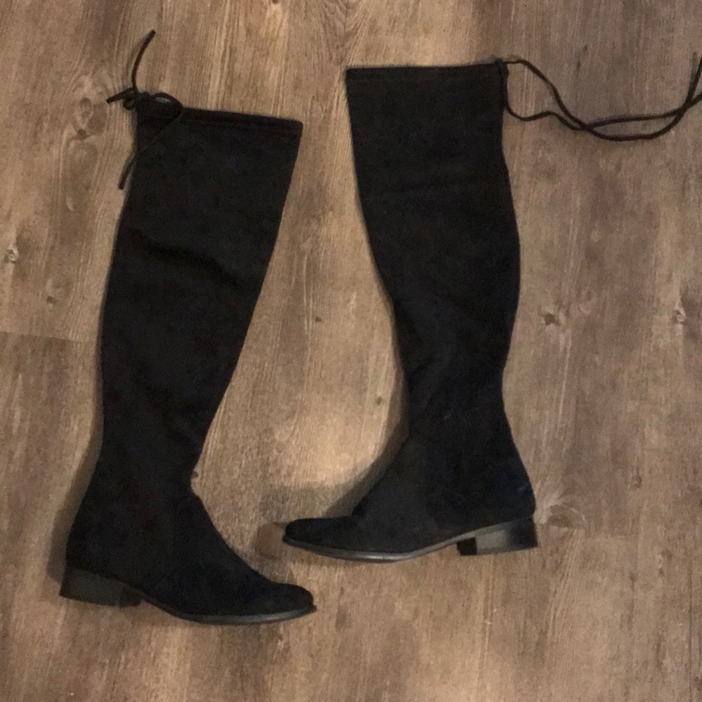 Thigh high black boots